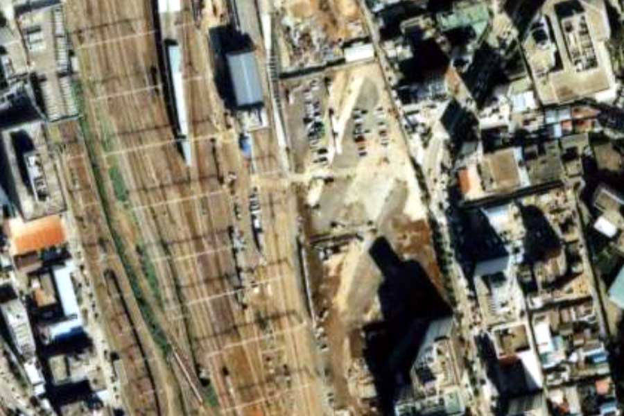 1990年頃のタカシマヤタイムズスクエア周辺の航空写真（画像：国土地理院）