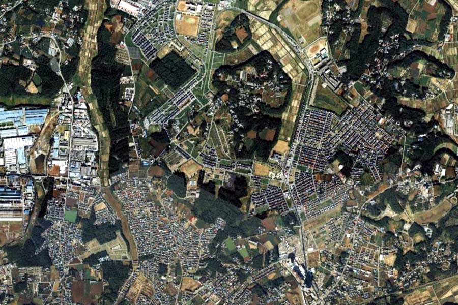 1990年頃の「ユーカリが丘」周辺の航空写真（画像：国土地理院）