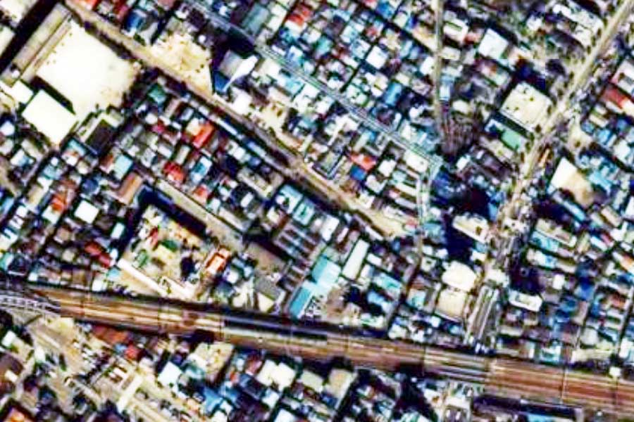 1985年頃の「三ノ輪橋駅」周辺の航空写真（画像：国土地理院）