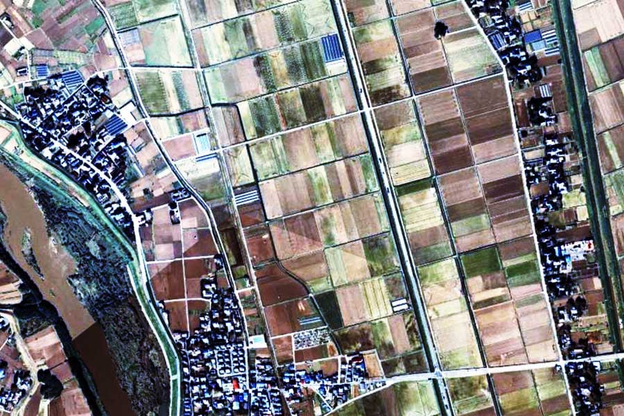 1990年頃の「常総IC」周辺の航空写真（画像：国土地理院）