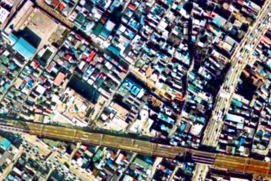1975年頃の「三ノ輪橋駅」周辺の航空写真（画像：国土地理院）