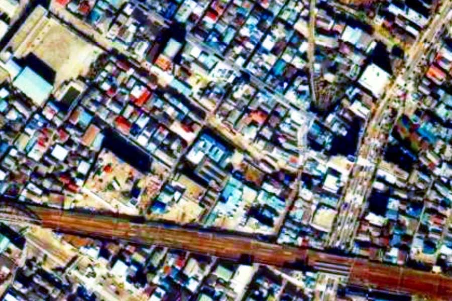 1980年頃の「三ノ輪橋駅」周辺の航空写真（画像：国土地理院）