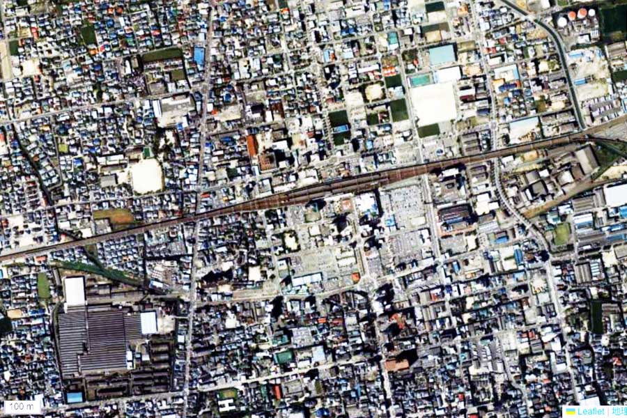 1990年頃の「佐賀駅」周辺の航空写真（画像：国土地理院）