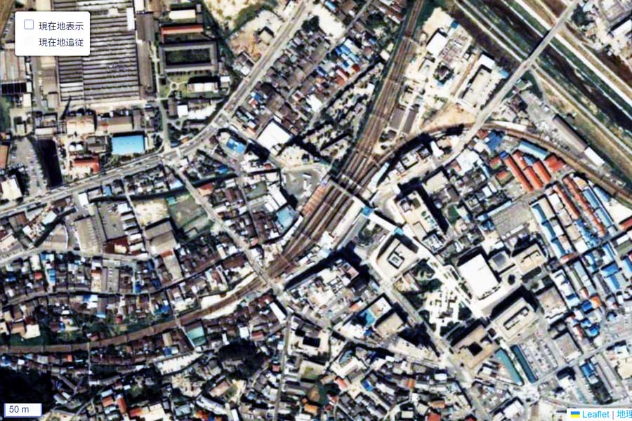 1980年頃に撮影された「枚方市駅」周辺の航空写真（画像：国土地理院）