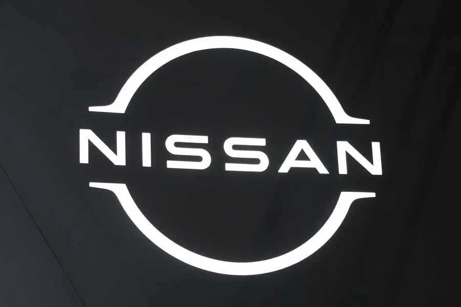 日産自動車のロゴマーク。2022年1月14日撮影(画像:時事)