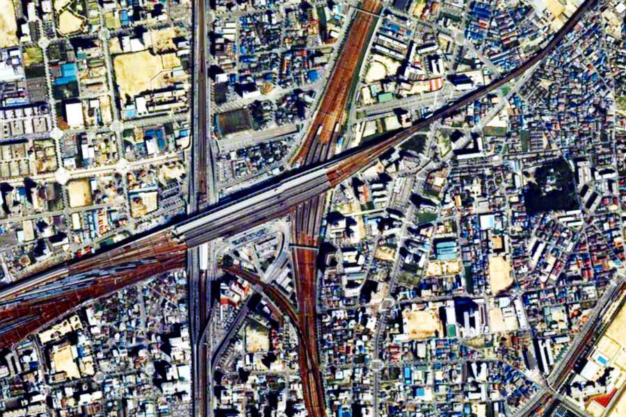 1980年頃の「新大阪駅」周辺の航空写真（画像：国土地理院）