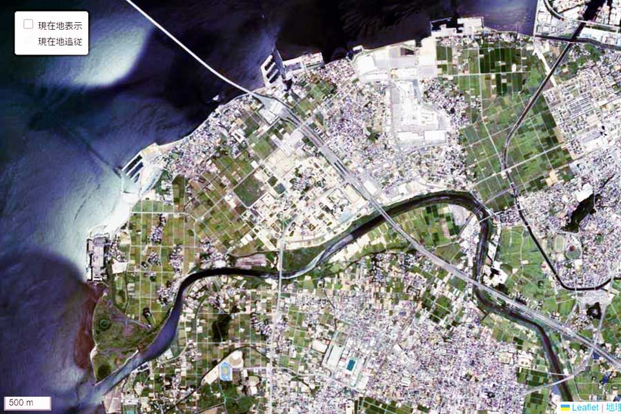 1990年頃に撮影された「東京湾アクアライン」千葉県側周辺の航空写真（画像：国土地理院）