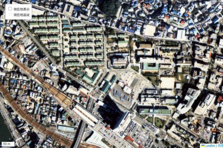 1990年頃の「広島駅」周辺の航空写真（画像：国土地理院）