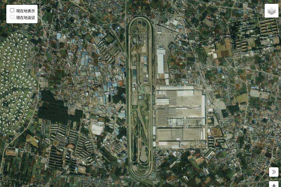 1990年頃の「日産村山工場」周辺の航空写真（画像：国土地理院）
