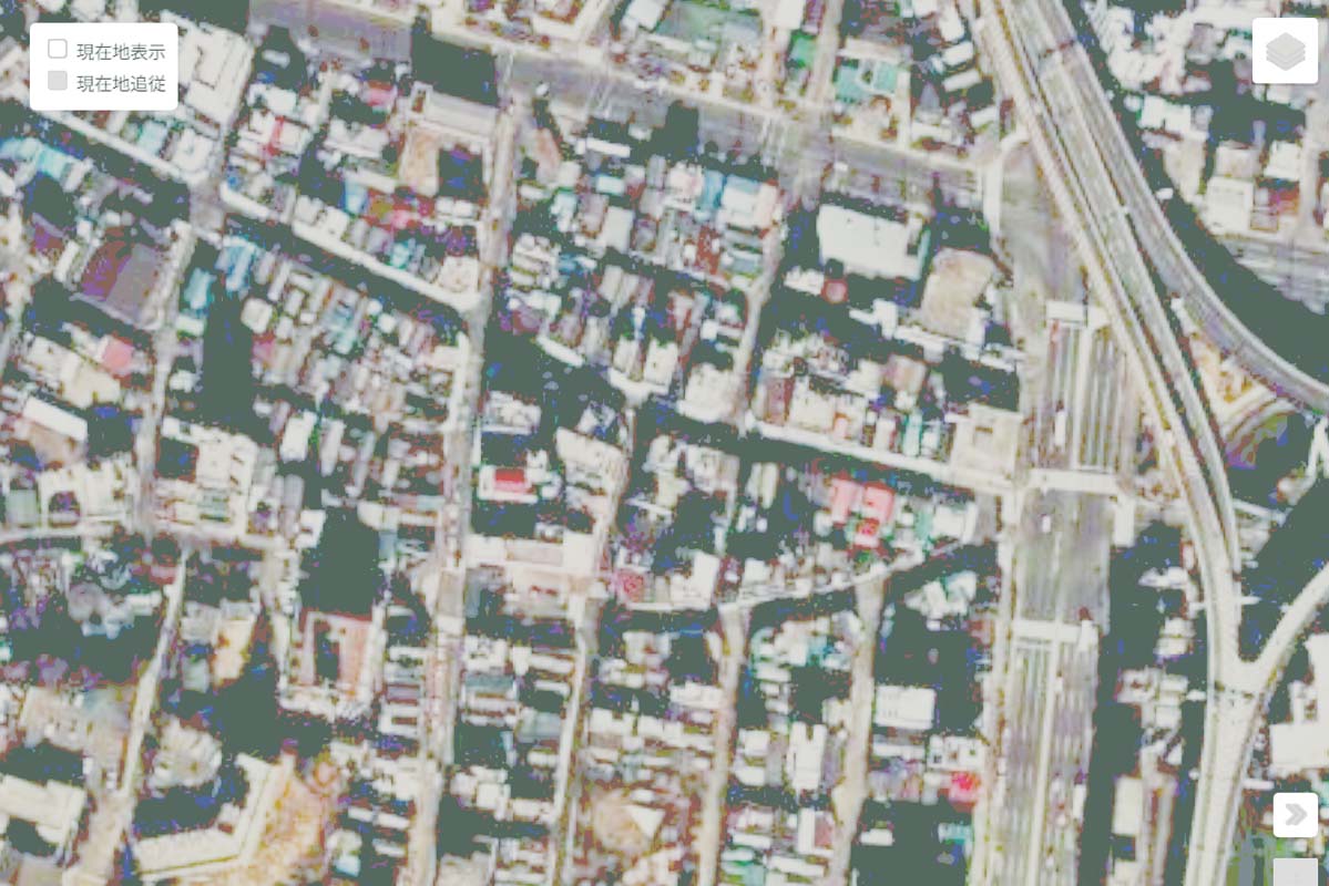 1975年頃の「麻布十番駅」周辺の航空写真（画像：国土地理院）