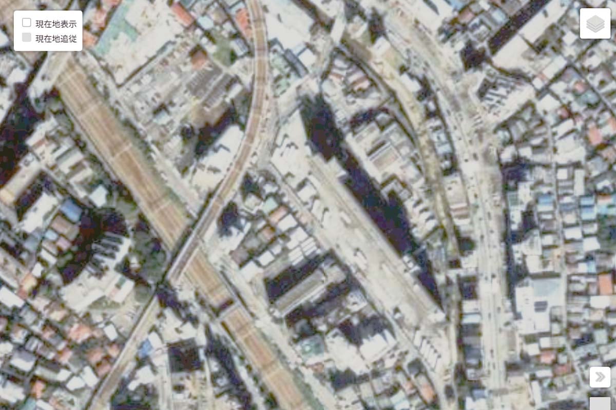 1990年頃の「渋谷営業所」周辺の航空写真（画像：国土地理院）