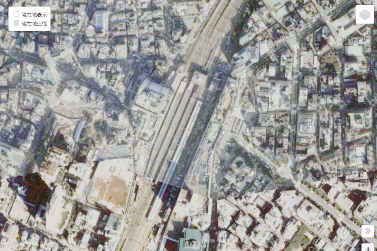 1990年頃の「池袋駅」周辺の航空写真（画像：国土地理院）