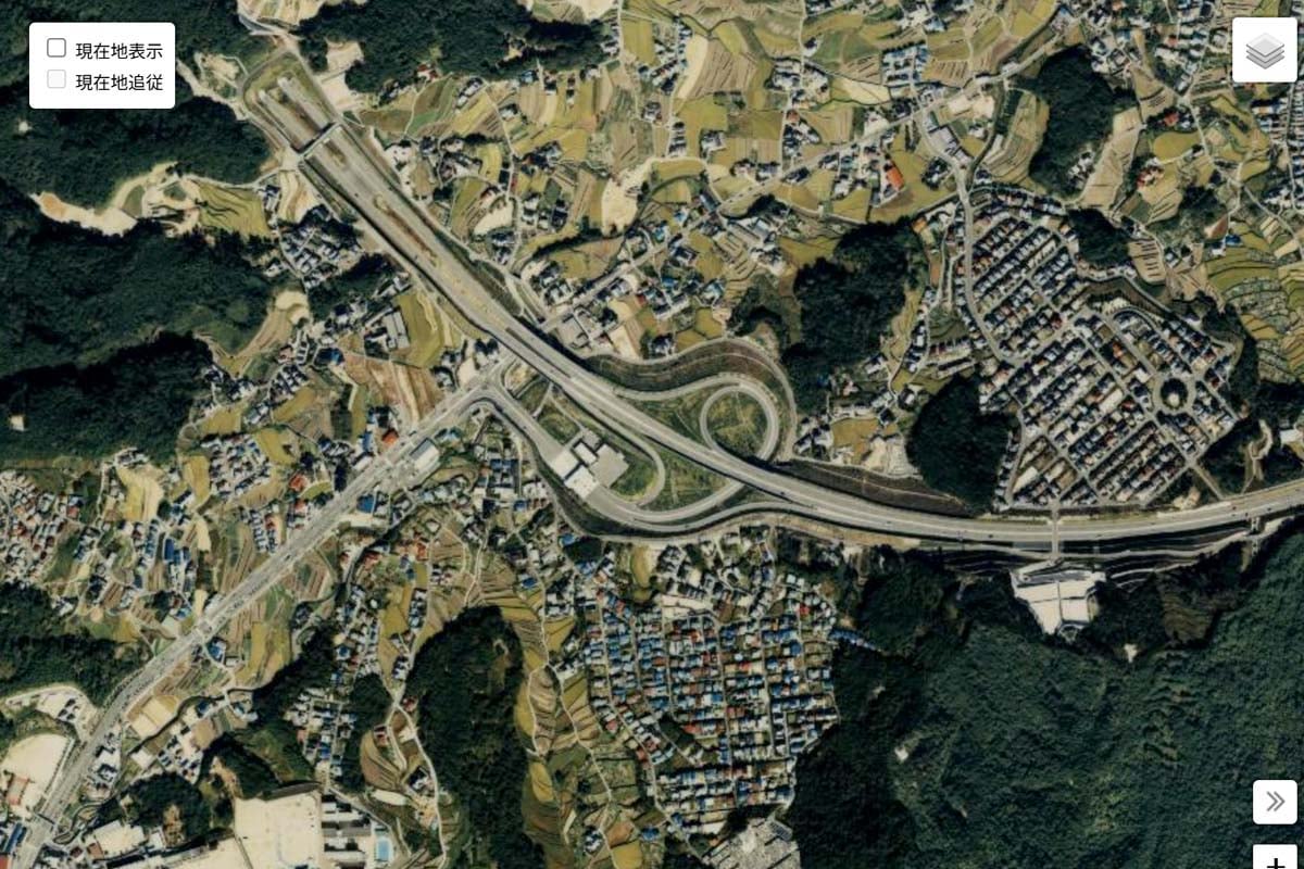 1990年頃の「広島東IC」周辺の航空写真（画像：国土地理院）