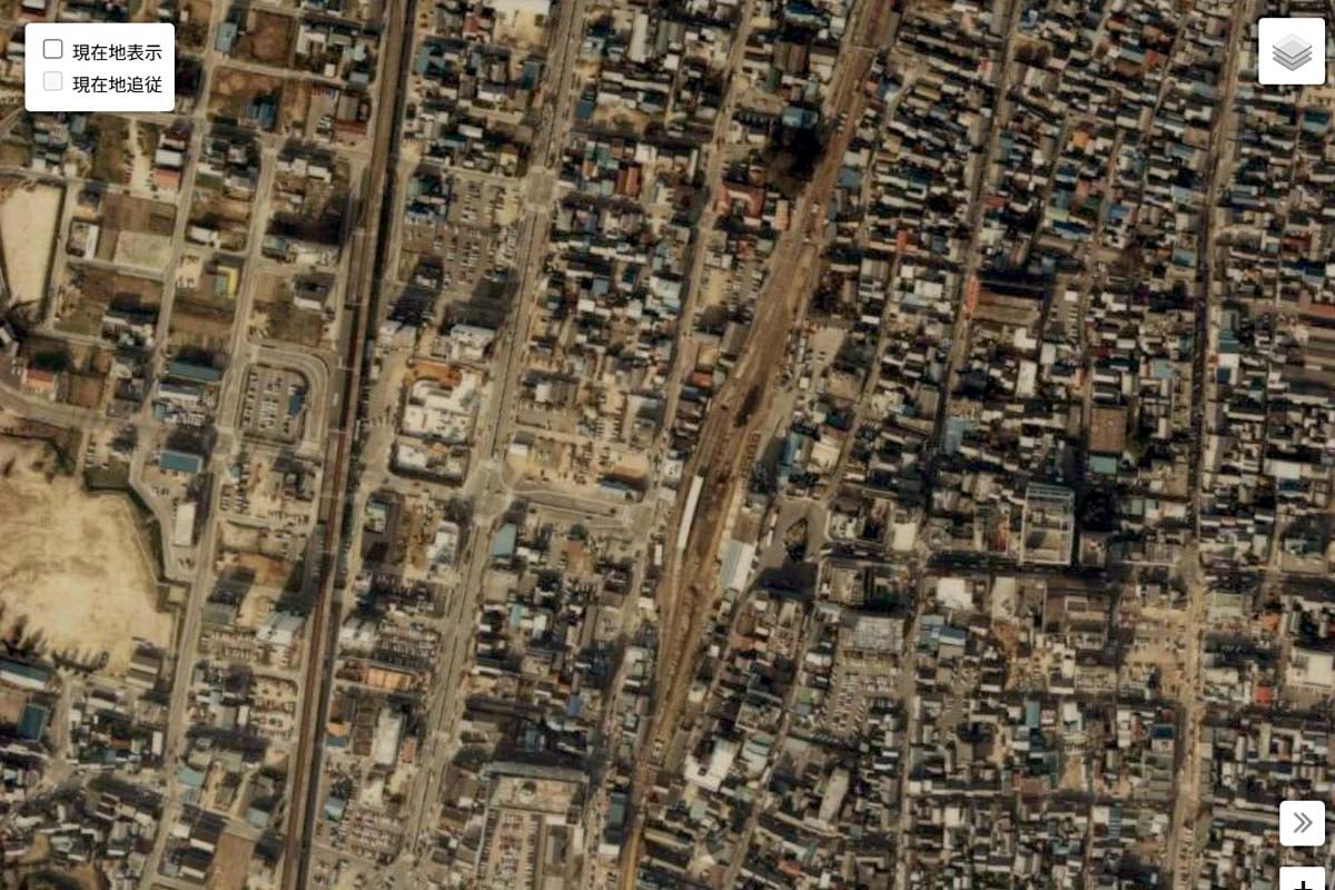 1980年頃の「豊田市駅」周辺の航空写真（画像：国土地理院）