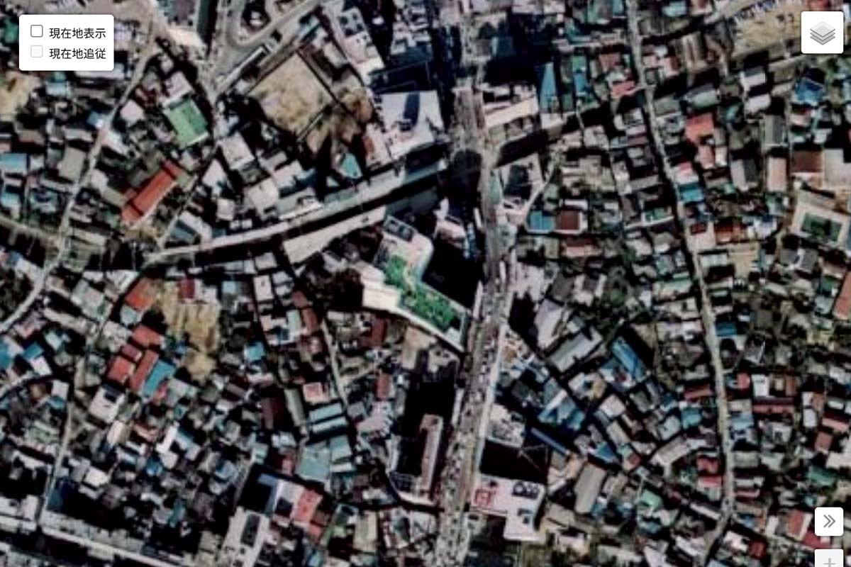 1975年頃の「京成船橋駅」周辺の航空写真（画像：国土地理院）